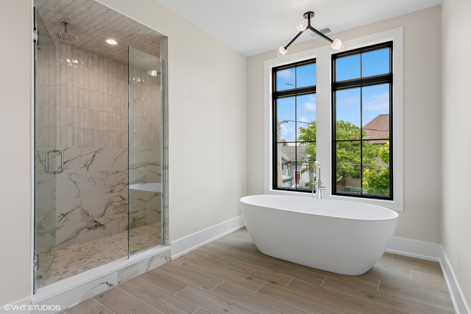 613 Chatham Avenue Elmhurst, IL 60126 - Photo 21 of 37 a white bath tub sitting next to a shower