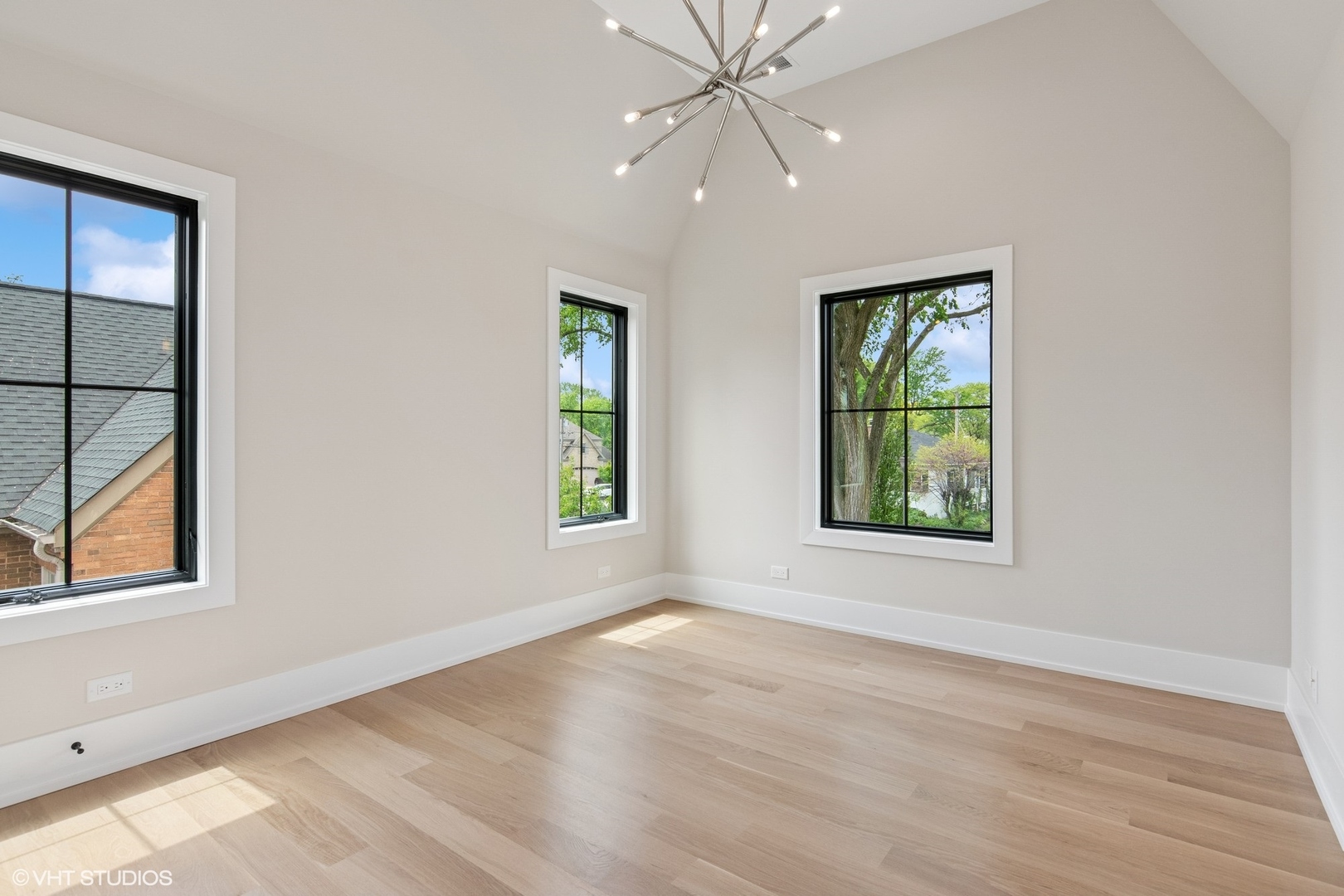 613 Chatham Avenue Elmhurst, IL 60126 - Photo 23 of 37 an empty room with windows and fan