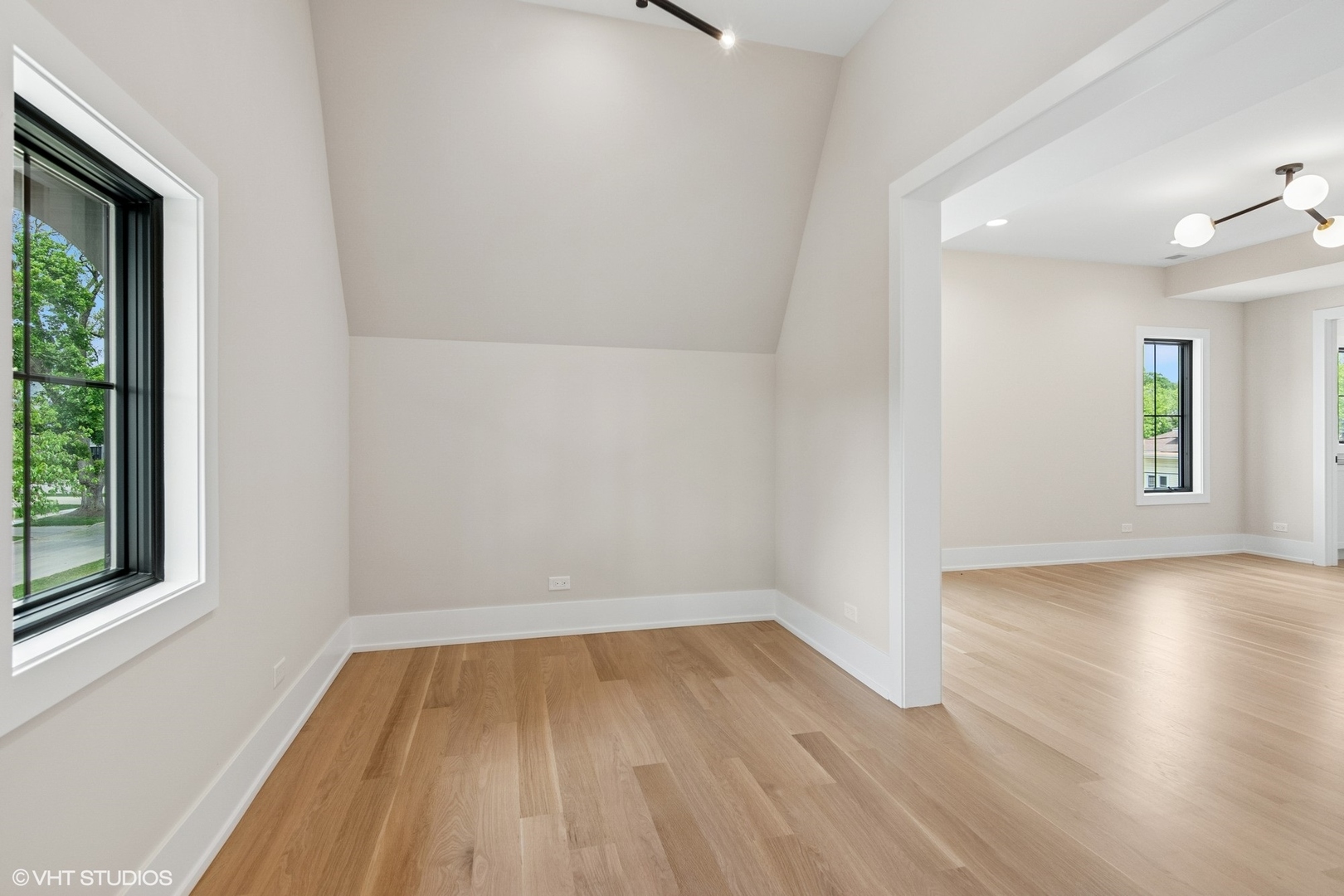 613 Chatham Avenue Elmhurst, IL 60126 - Photo 28 of 37 a view of a room with wooden floor and windows