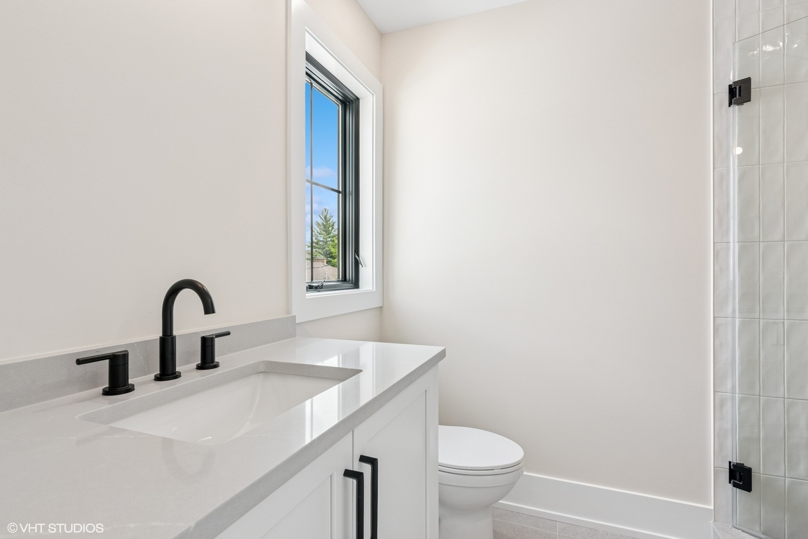 613 Chatham Avenue Elmhurst, IL 60126 - Photo 30 of 37 a bathroom with a sink and a toilet