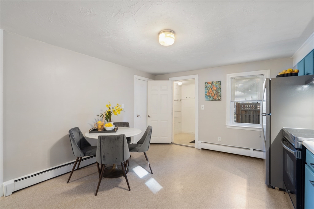 27 Water Street Concord, MA 01742 - Photo 12 of 21 a workspace with furniture and a window