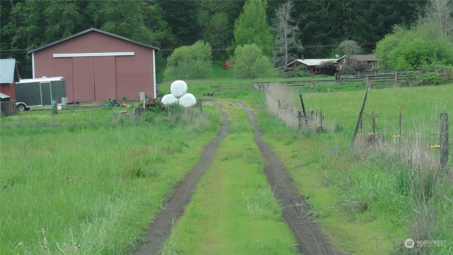 0 State Route 506 Toledo, WA 98591 - Photo 25 of 36 a backyard of a house with table and chairs