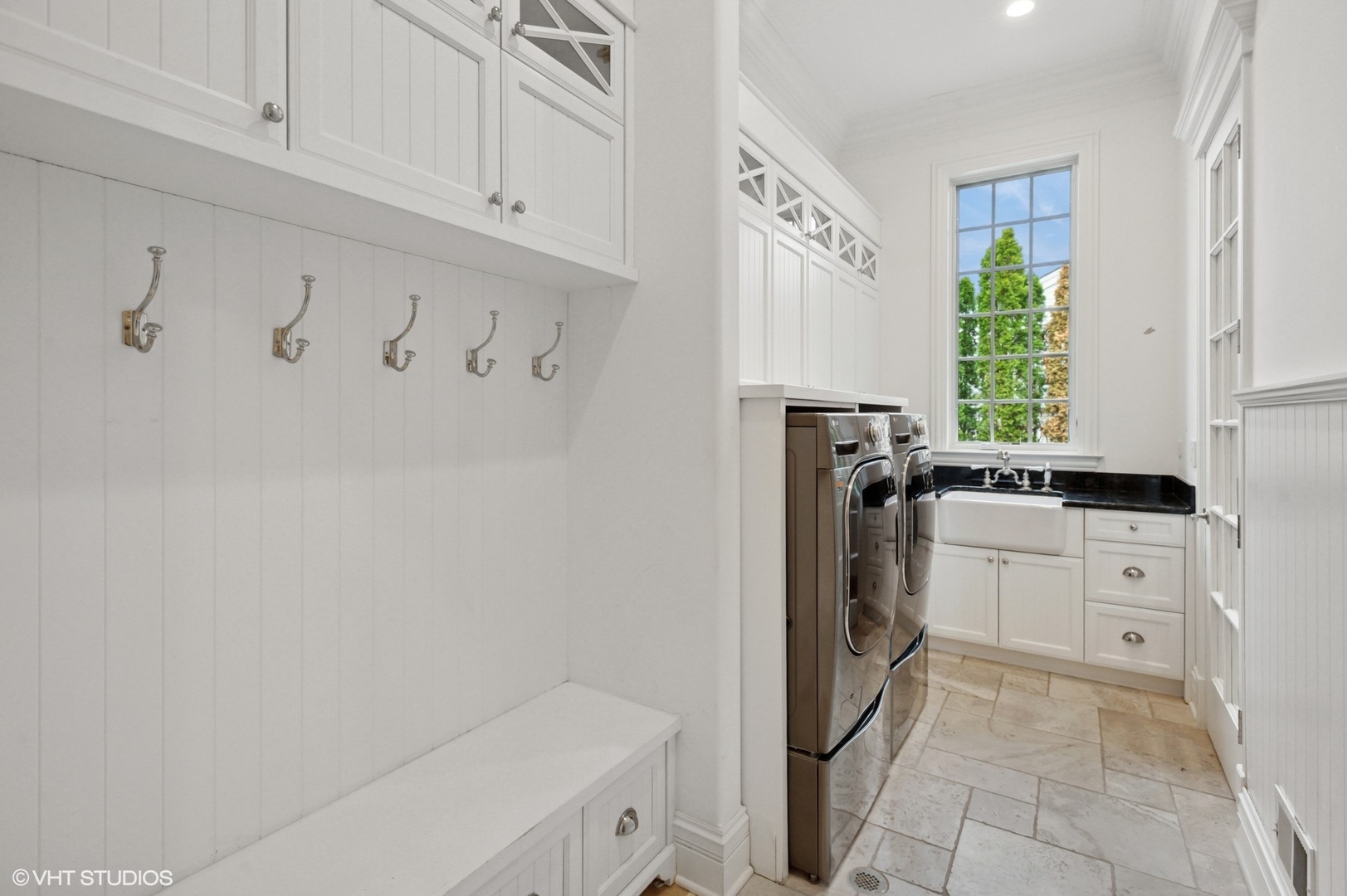 78 Wagner Road Northfield, IL 60093 - Photo 29 of 66 a kitchen with a refrigerator and white cabinets