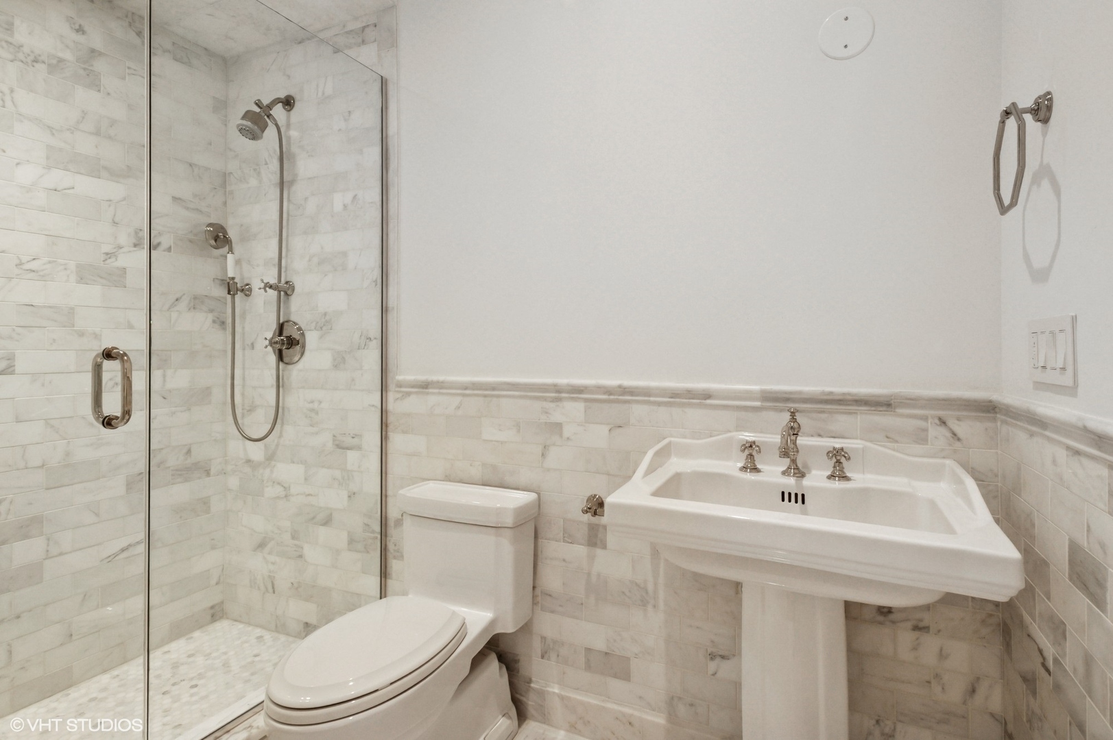 78 Wagner Road Northfield, IL 60093 - Photo 37 of 66 a bathroom with a sink toilet and shower