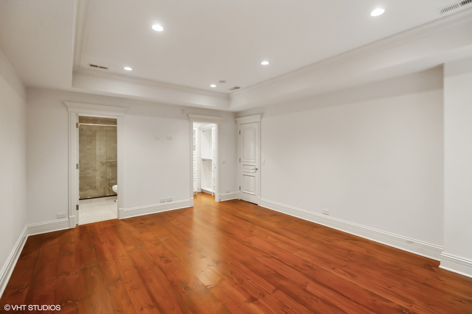 78 Wagner Road Northfield, IL 60093 - Photo 42 of 66 a view of an empty room with wooden floor