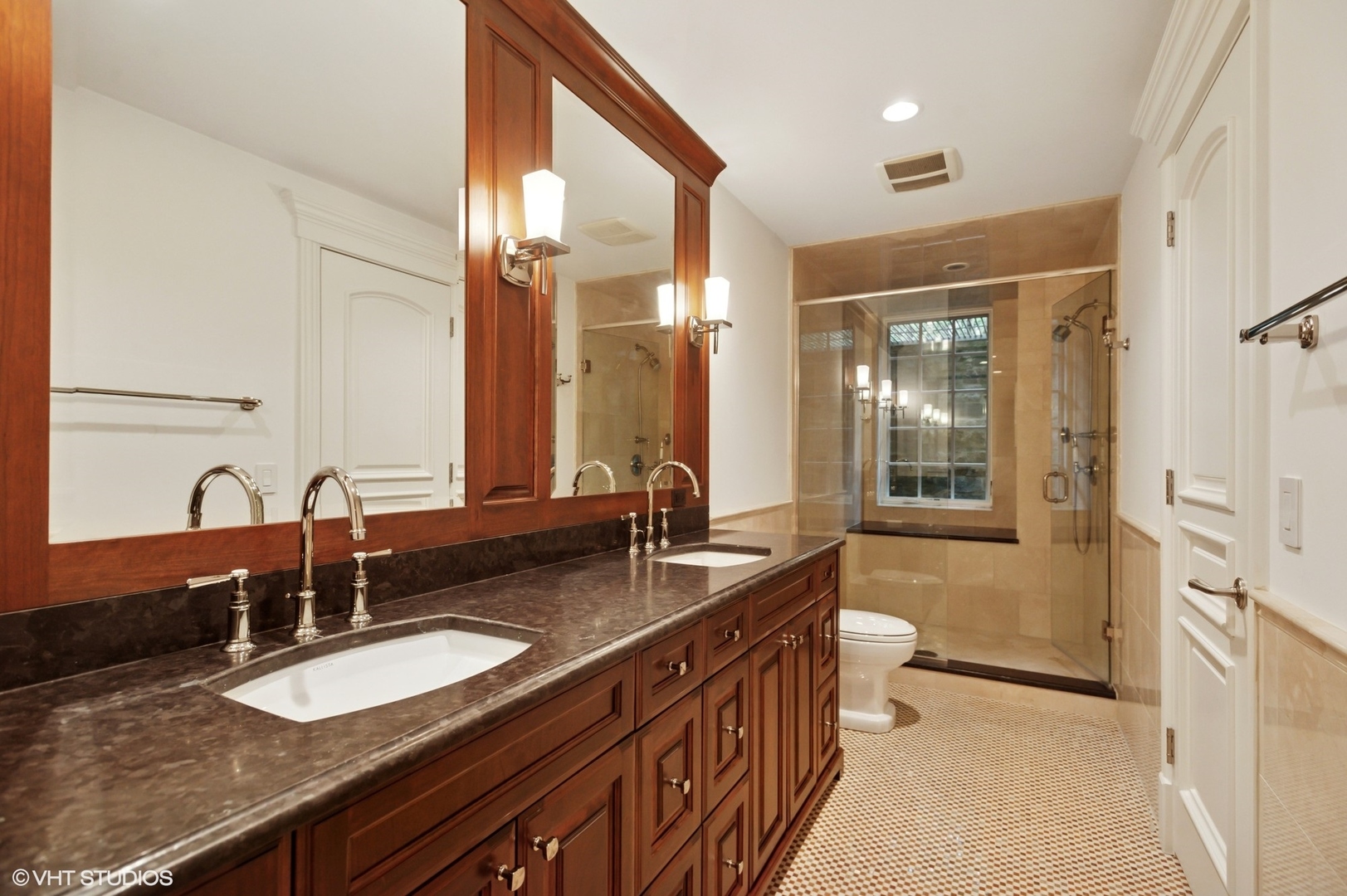 78 Wagner Road Northfield, IL 60093 - Photo 46 of 66 a bathroom with a granite countertop sink and a mirror