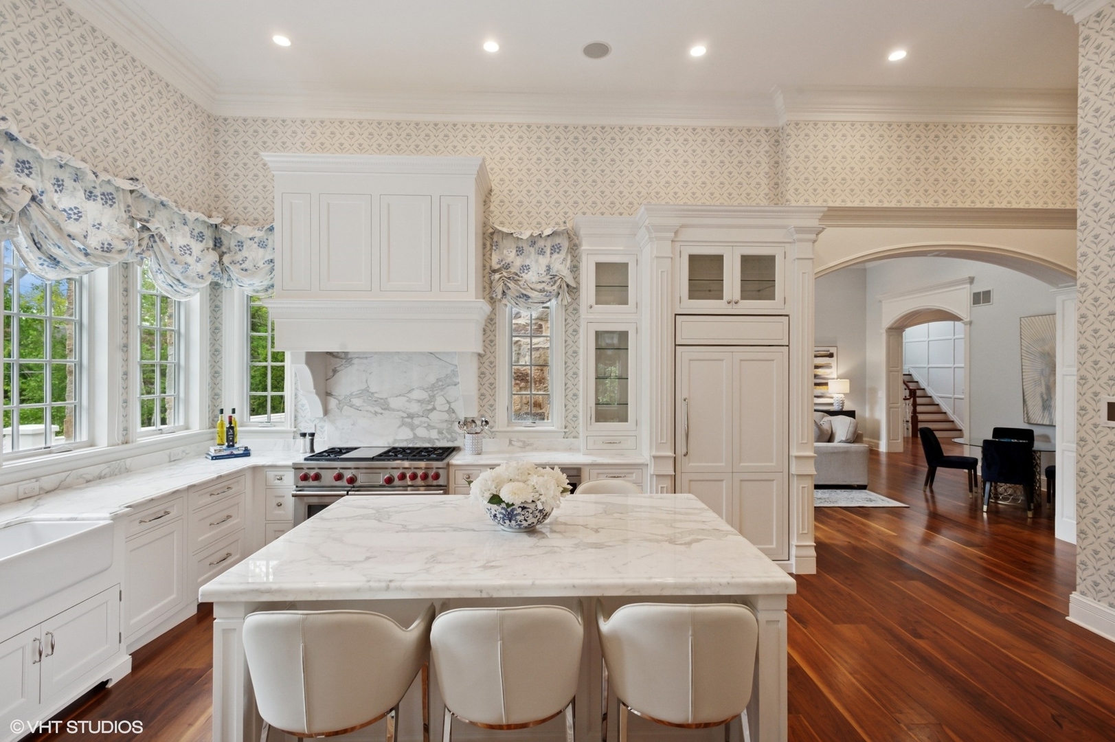78 Wagner Road Northfield, IL 60093 - Photo 5 of 66 a kitchen with a table chairs sink and cabinets