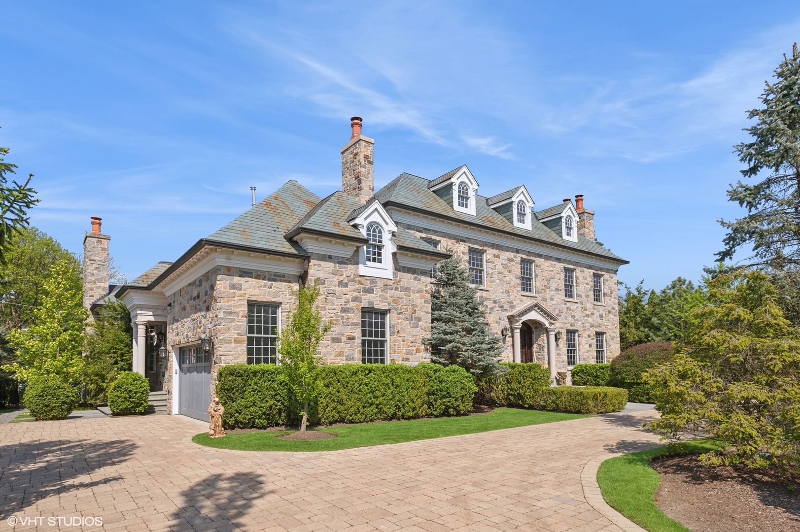 78 Wagner Road Northfield, IL 60093 - Photo 51 of 66 a front view of a house with a yard