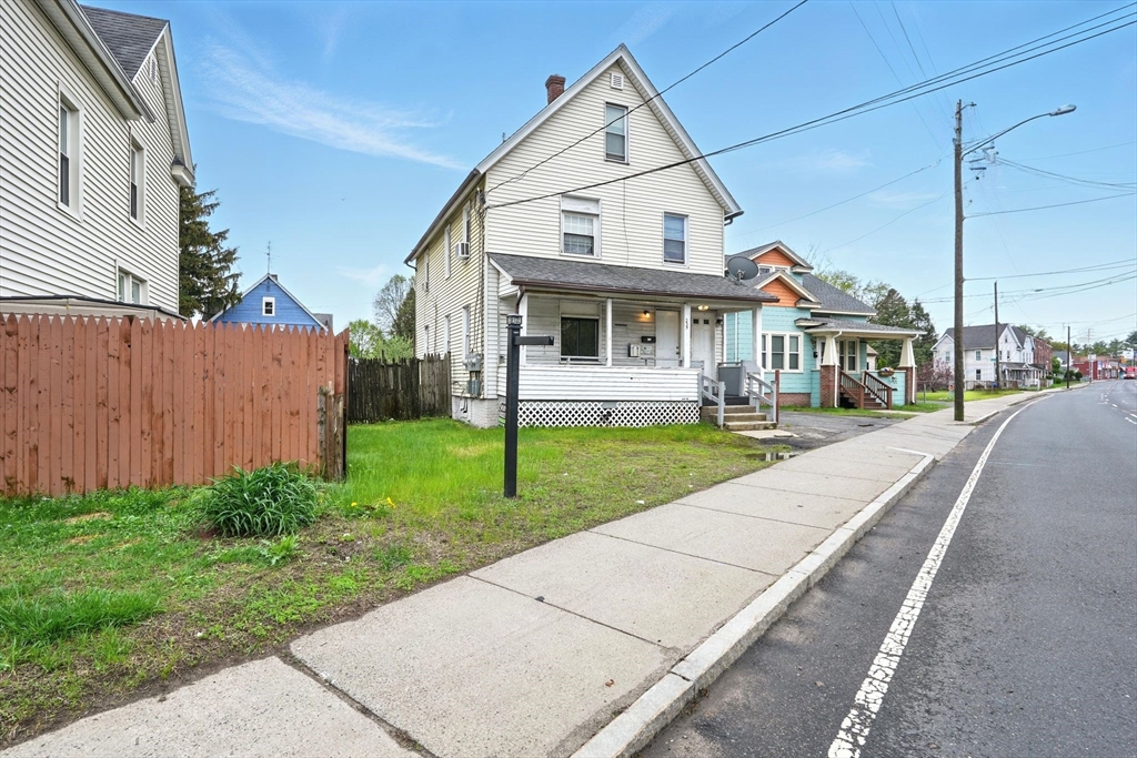 235 Boston Road Springfield, MA 01109 - Photo 3 of 23 a front view of a house with garden