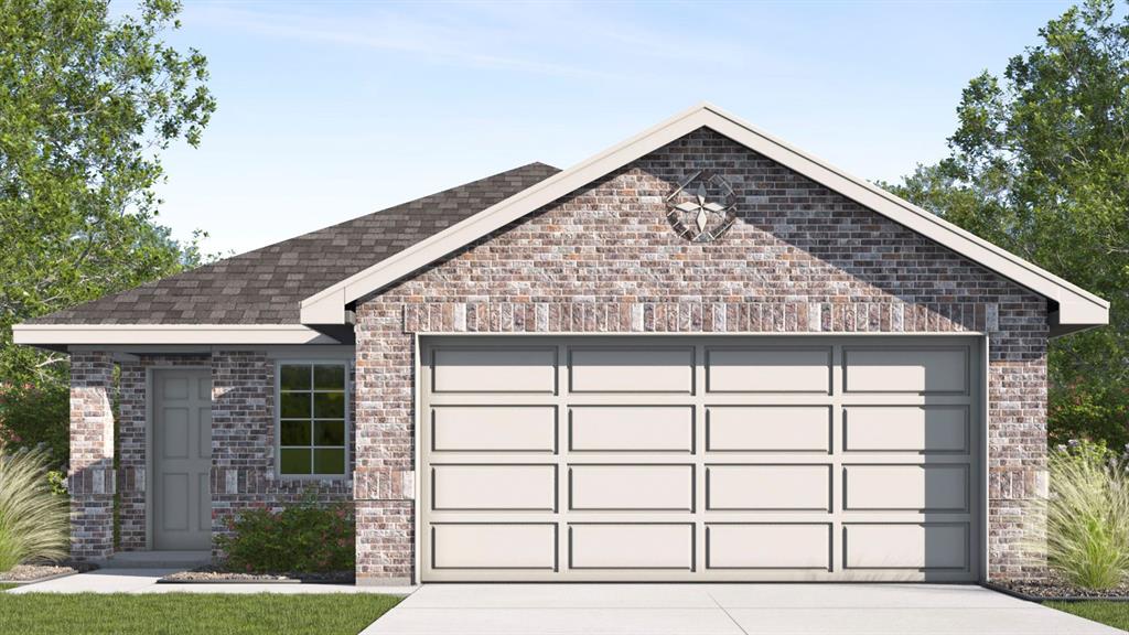 Brick exterior with a shingled roof and a two-car garage