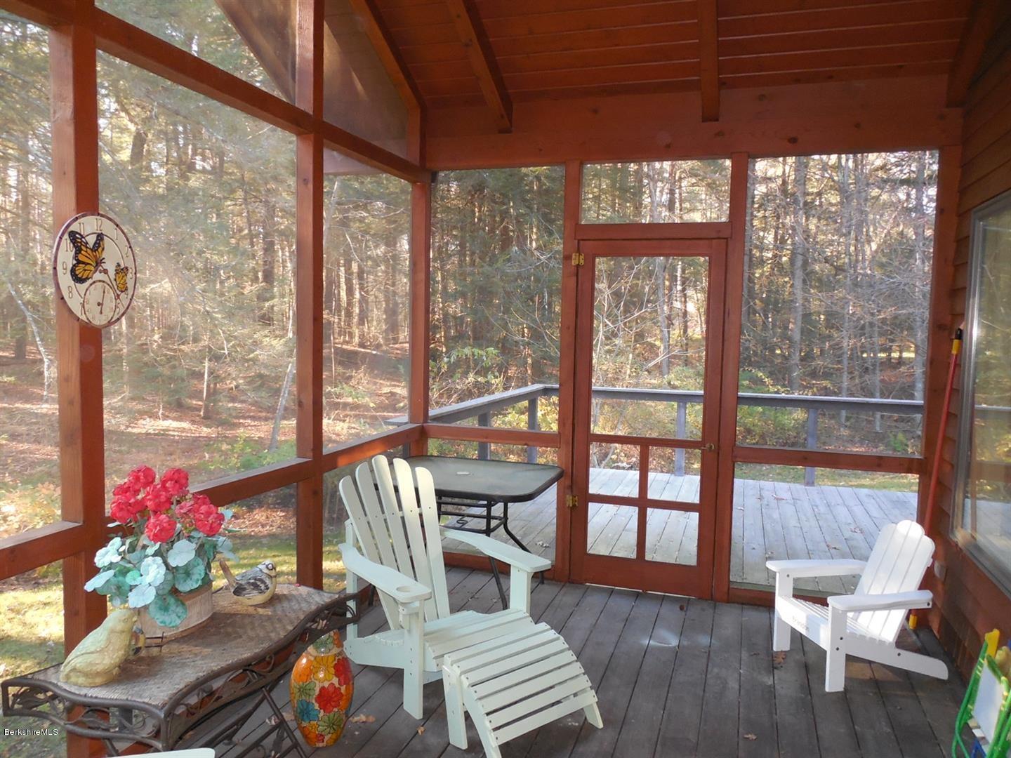 34 Glendale Road Stockbridge, MA 01262 - Photo 11 of 24 a living room with furniture and a large window