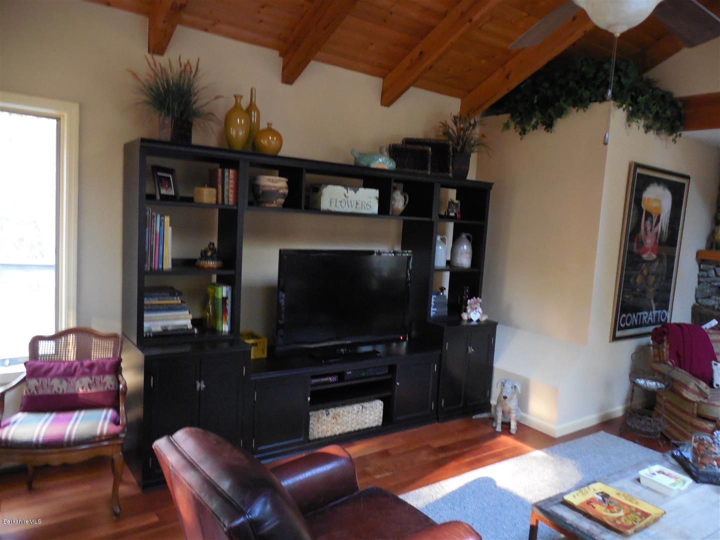 34 Glendale Road Stockbridge, MA 01262 - Photo 5 of 24 a living room with furniture and a flat screen tv