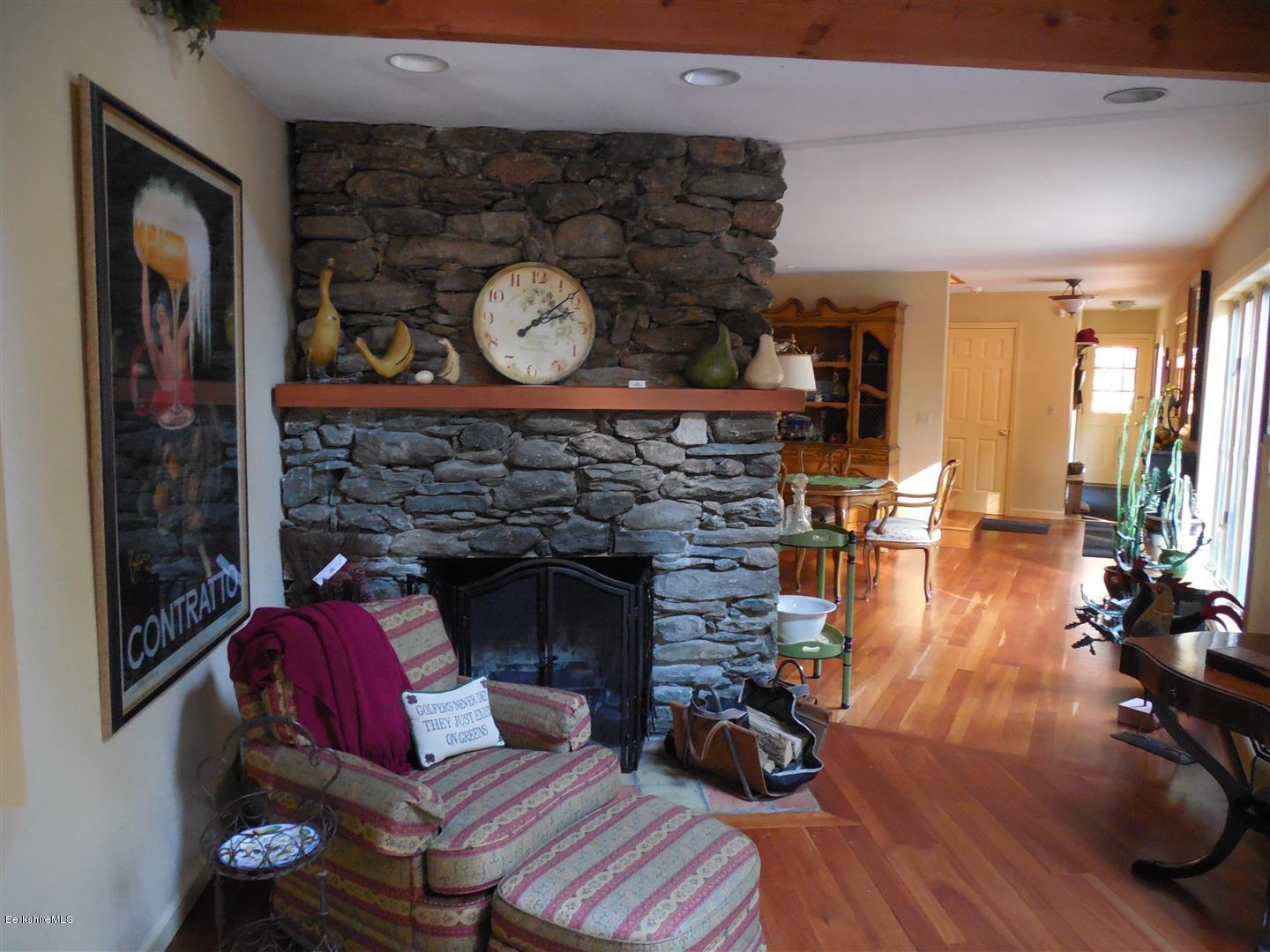 34 Glendale Road Stockbridge, MA 01262 - Photo 6 of 24 a living room with furniture and a fireplace
