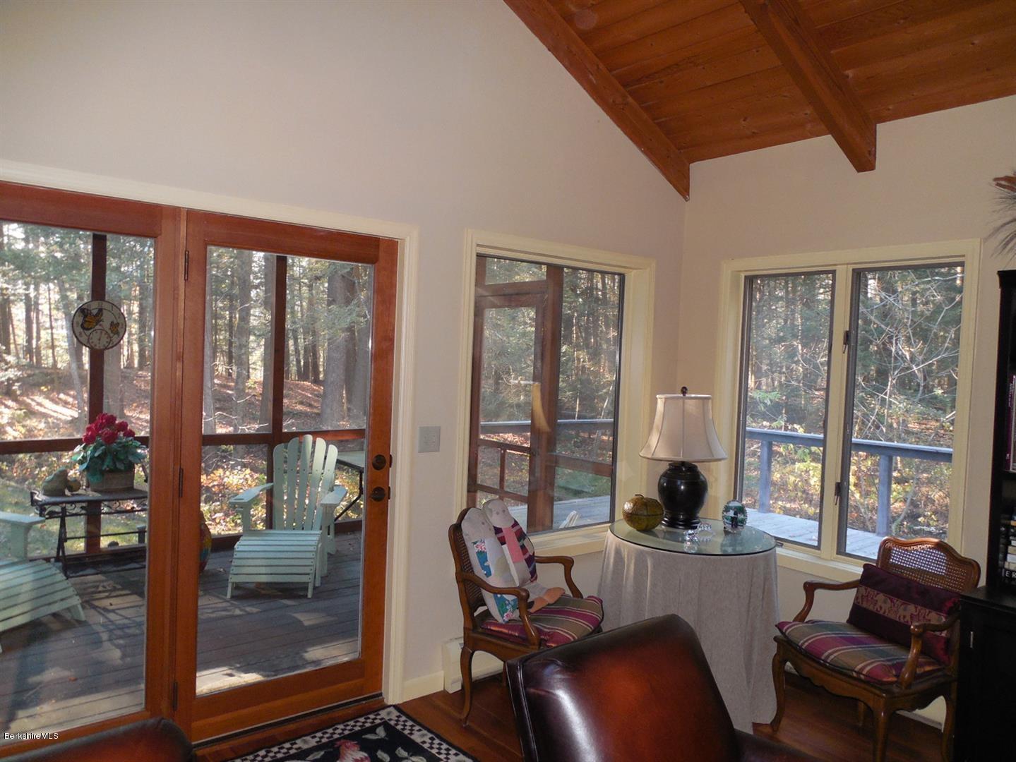 34 Glendale Road Stockbridge, MA 01262 - Photo 7 of 24 a living room with furniture and a floor to ceiling window