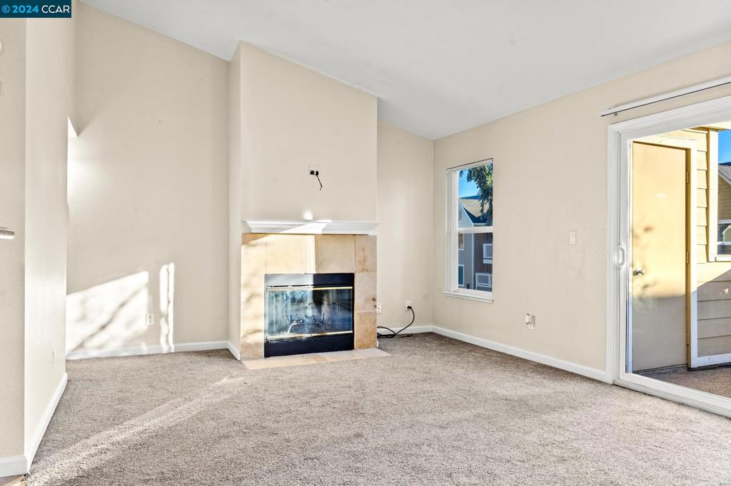 285 Reflections Drive San Ramon, CA 94583 - Photo 4 of 42 a view of empty room with a fireplace