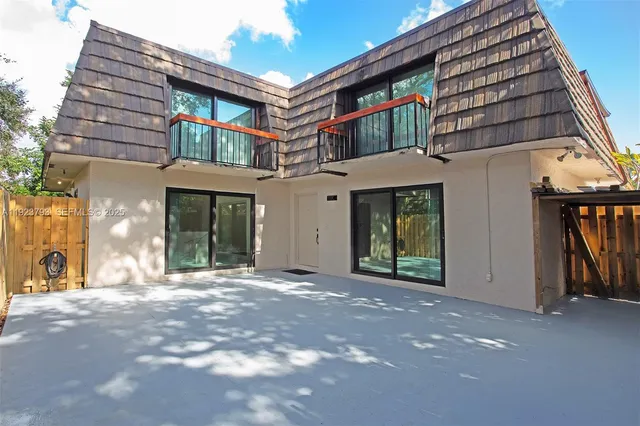 a view of a building with a porch