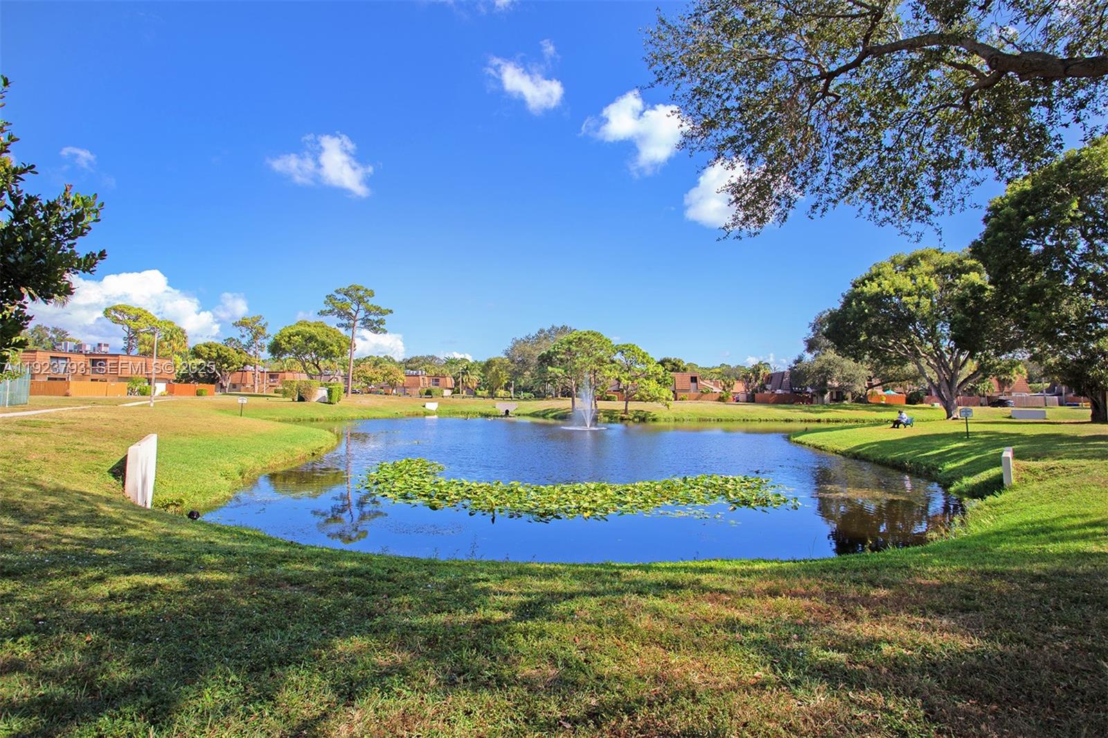 4059 Palm Bay Circle, Unit C West Palm Beach, FL 33406 - Photo 25 of 27 a view of swimming pool with a yard