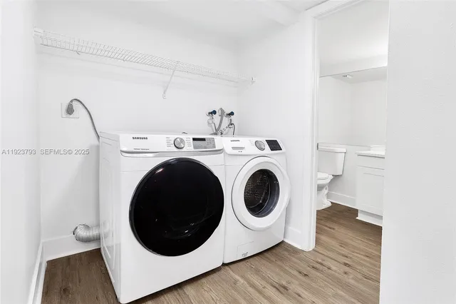 a utility room with dryer and washer