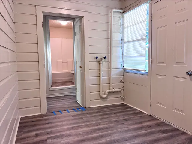 a view of a small space built with hardwood