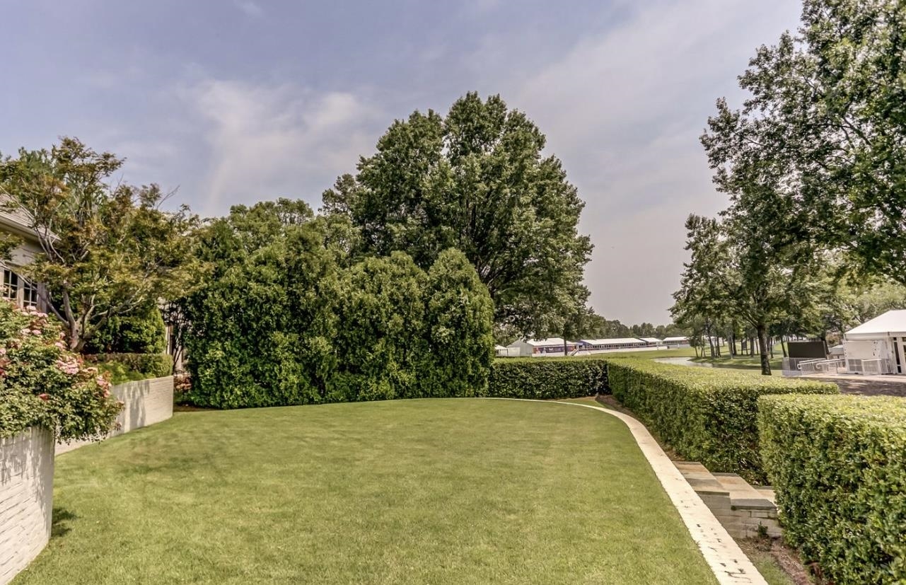 8575 The Island Memphis, TN 38125 - Photo 36 of 40 a view of outdoor space and yard