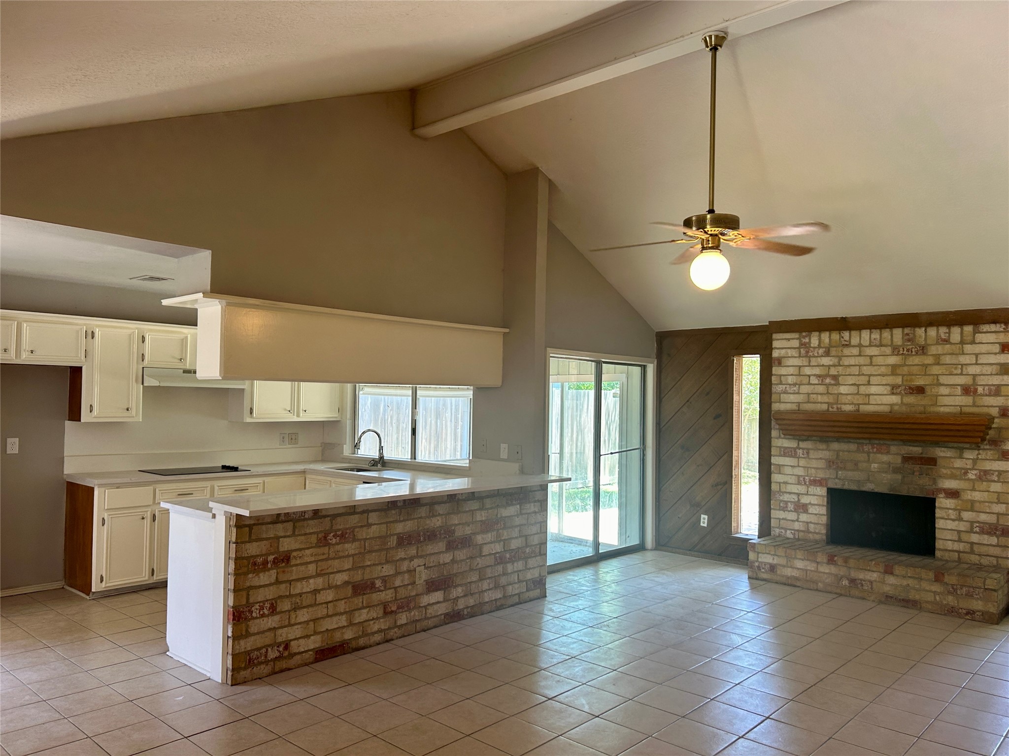 2510 Knollbrook Lane Spring, TX 77373 - Photo 7 of 24 a kitchen with a stove and a fireplace