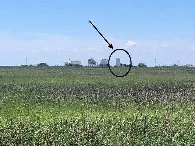 a view of a lake in middle of the city