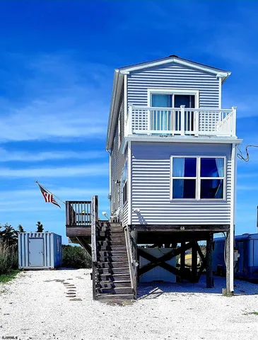 a view of a back yard from a balcony