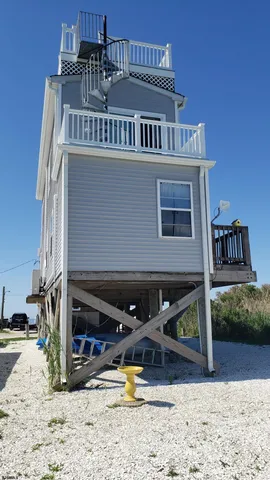 a view of a house with a wooden door