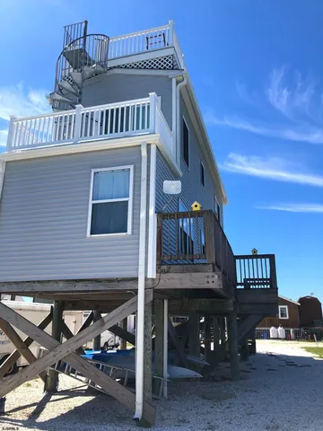 a balcony with view of ocean