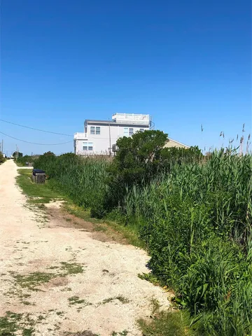 a view of a lake from a balcony