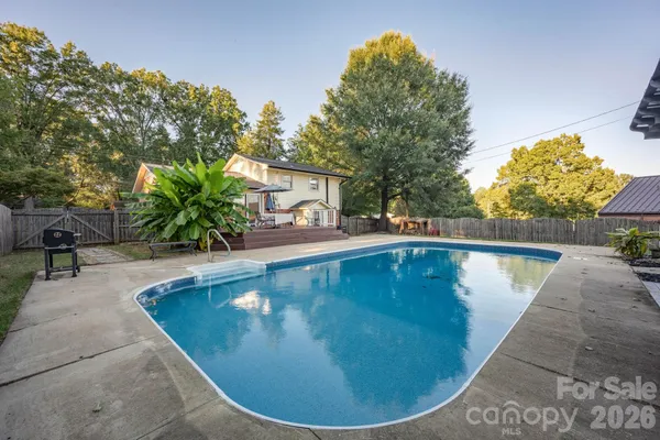 a view of a backyard with a sink and a slide
