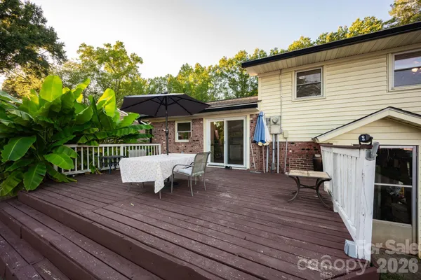 a view of a patio with furniture