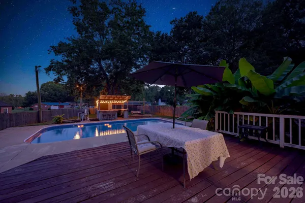 a view of outdoor space and swimming pool