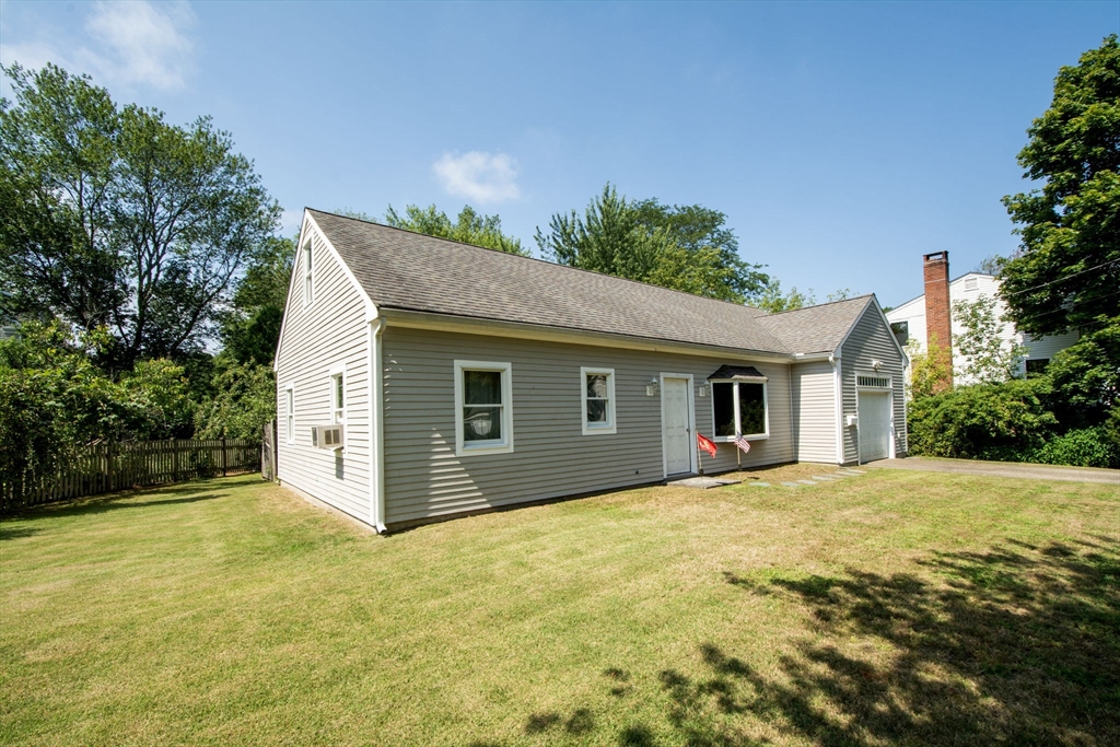 a house with trees in front of it