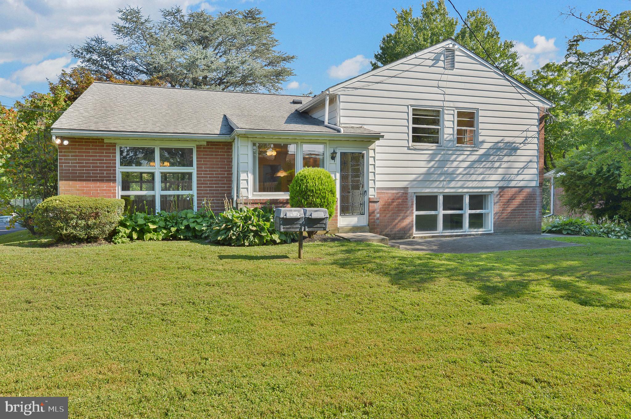 1205 Manoa Road Wynnewood, PA 19096 - Photo 17 of 44 Rear exterior, patio and yard