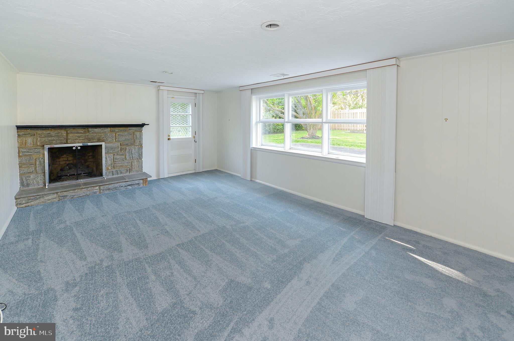 1205 Manoa Road Wynnewood, PA 19096 - Photo 34 of 44 Family room with fireplace