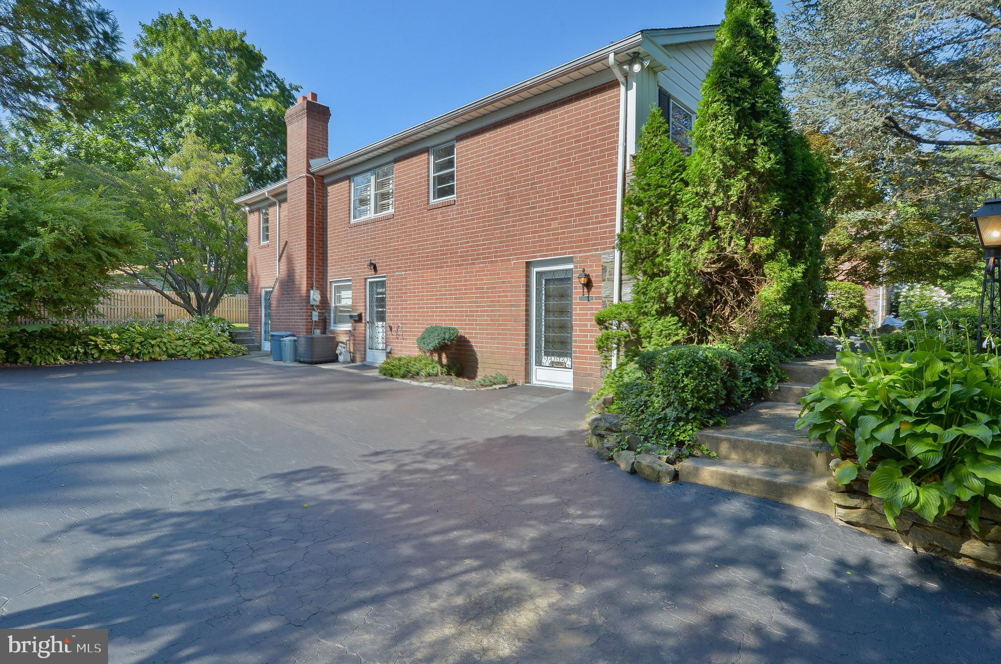 1205 Manoa Road Wynnewood, PA 19096 - Photo 38 of 44 Driveway and side exterior