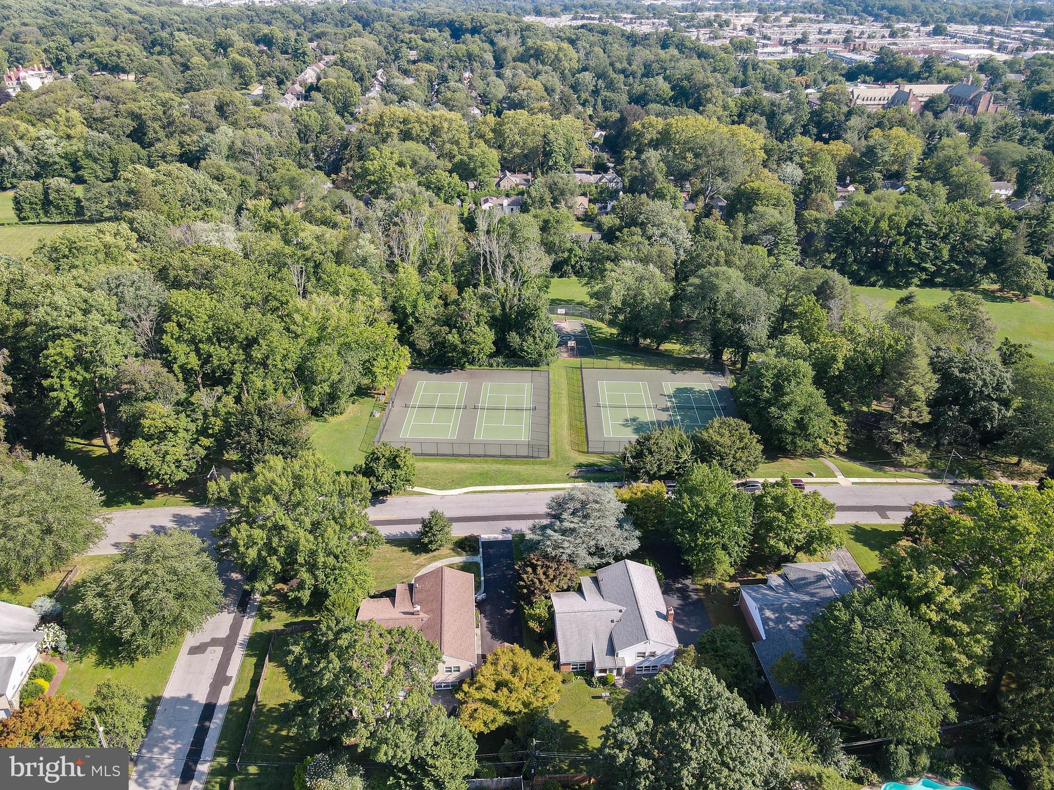 1205 Manoa Road Wynnewood, PA 19096 - Photo 6 of 44 Aerial view of house, park, and tennis courts