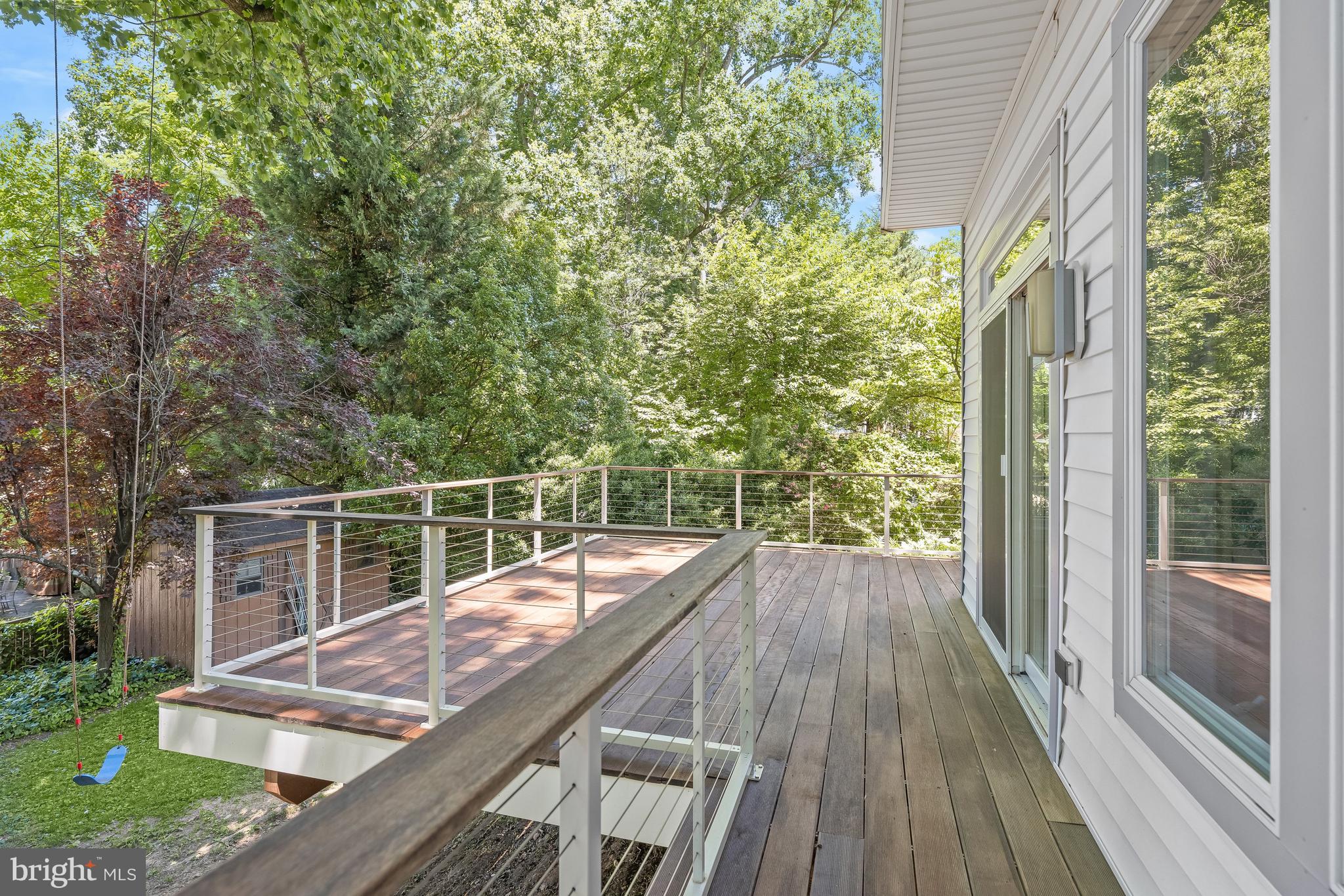 8800 Maywood Avenue Silver Spring, MD 20910 - Photo 11 of 41 a view of balcony with wooden floor and fence
