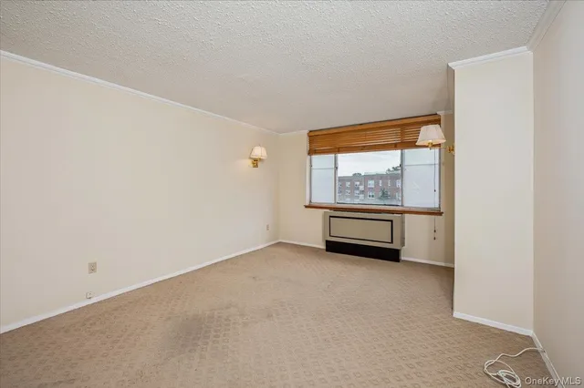 an empty room with large window