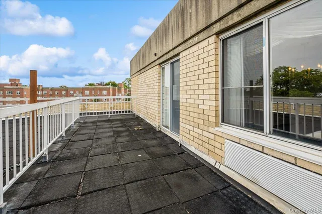 a view of a balcony with city view