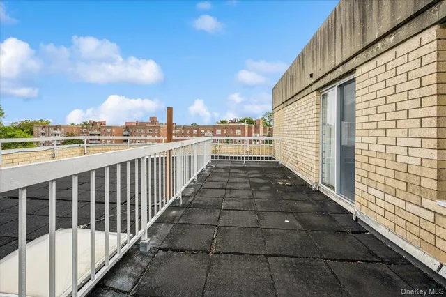 a view of a balcony with city view