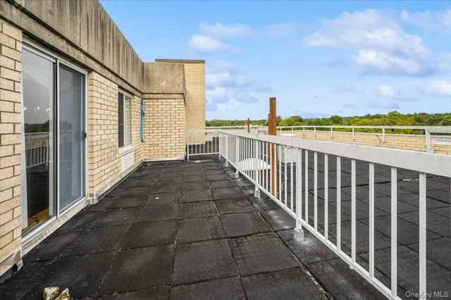 a view of a balcony with city view