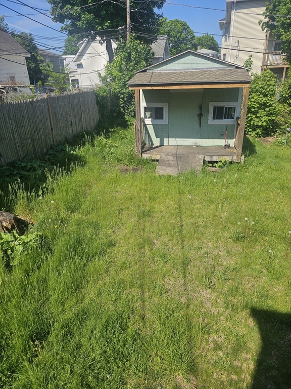 40 Merrick Street, Unit A Worcester, MA 01609 - Photo 25 of 32 a view of a house with a yard and plants