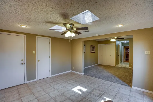 a view of garage with stairs