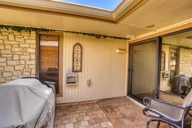 a view of swimming pool with a yard