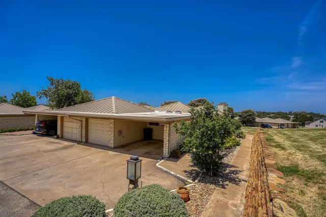 a view of a house with a garage