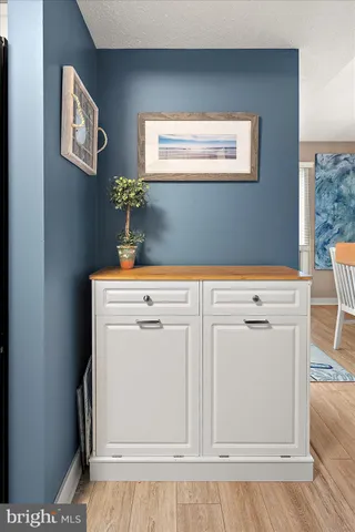 a bathroom with a toilet a sink and a mirror