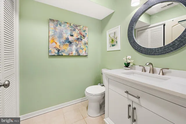 a view of an entryway with wooden floor and door