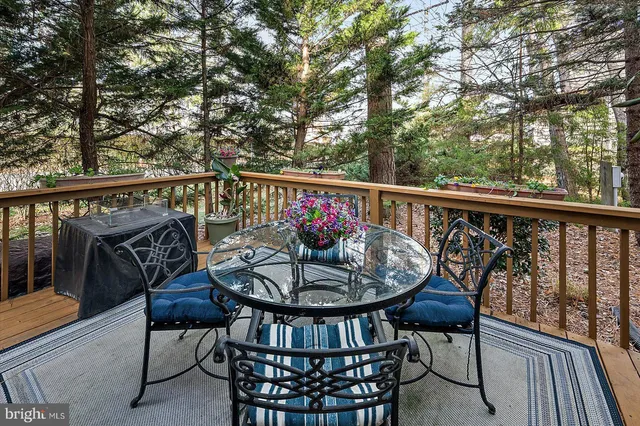 an aerial view of residential house with outdoor space and parking